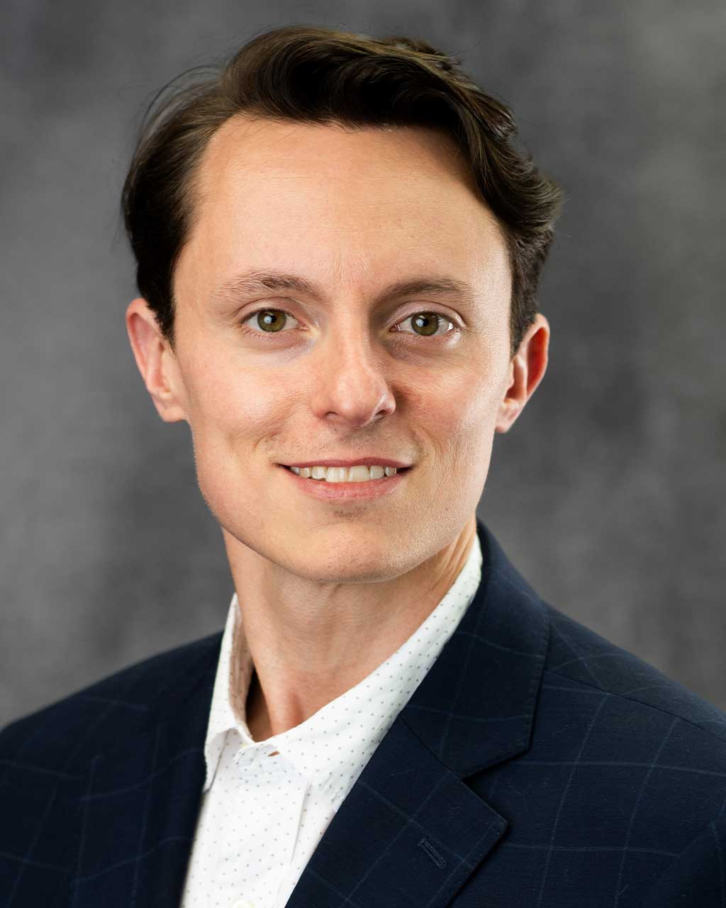 Professional headshot of Jett Trudeau